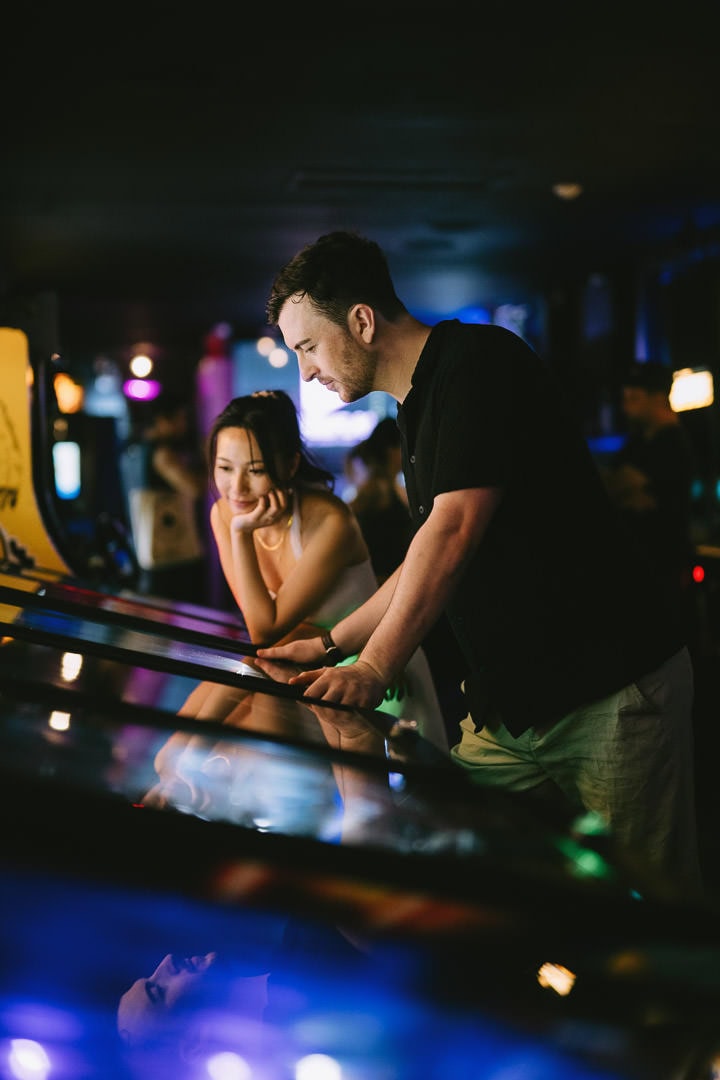Cinematic date night engagement portrait, Freeplay arcade, Toronto