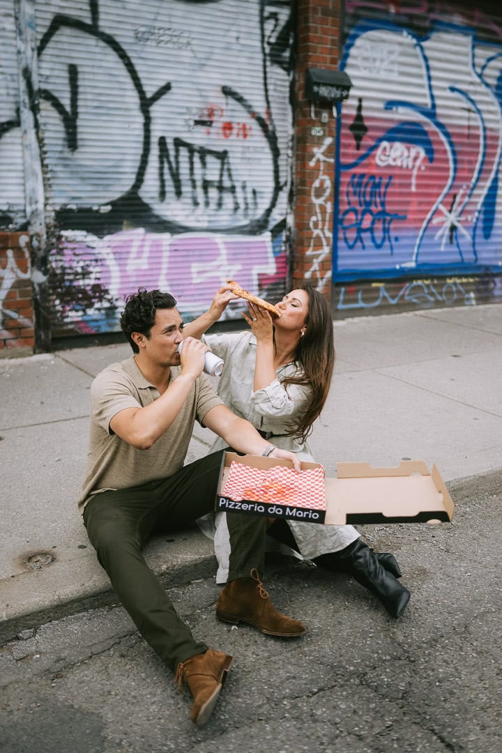 Editorial engagement portrait, grungy urban setting, Kensington Market, Toronto
