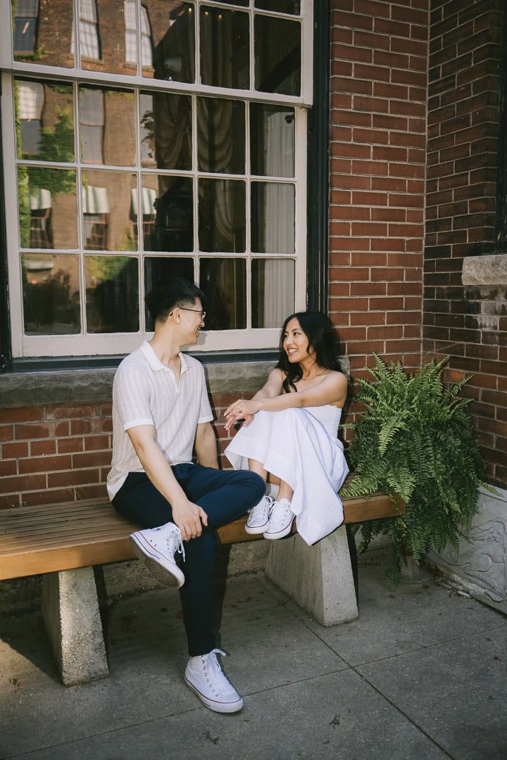Casual engagement portrait in the courtyard, Liberty Village, Toronto