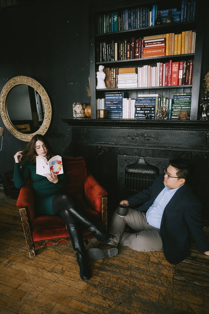 Engagement portrait by the bookshelf, OBJX Studio, Toronto