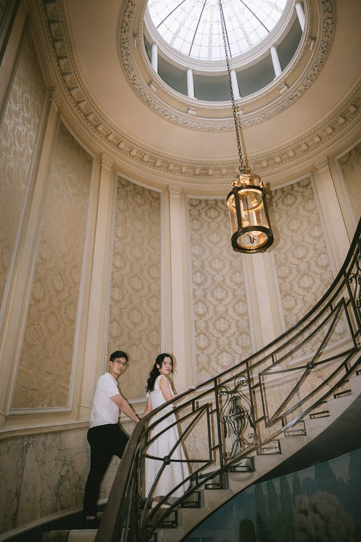Cinematic portrait on spiral staircase, Parkwood Estate interior, Oshawa