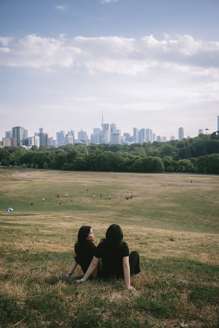 Engagement portrait overlooking the Toronto skyline, Riverdale Park