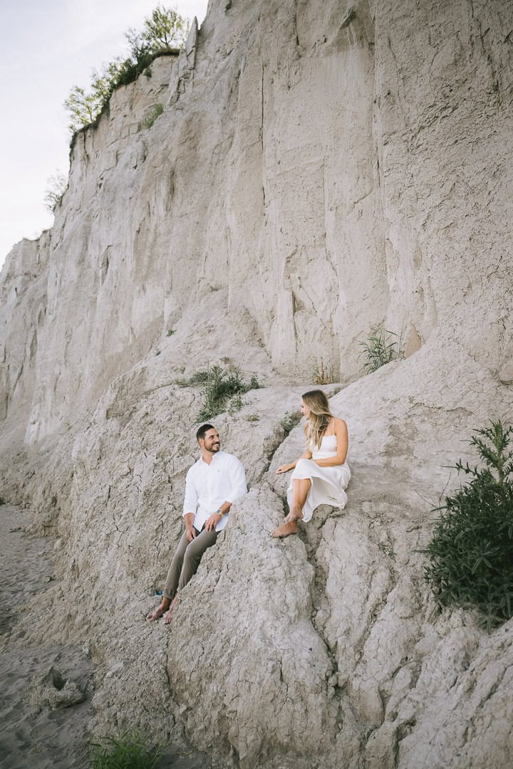 Couple sitting on the bluff, Scarborough Bluffs, Toronto
