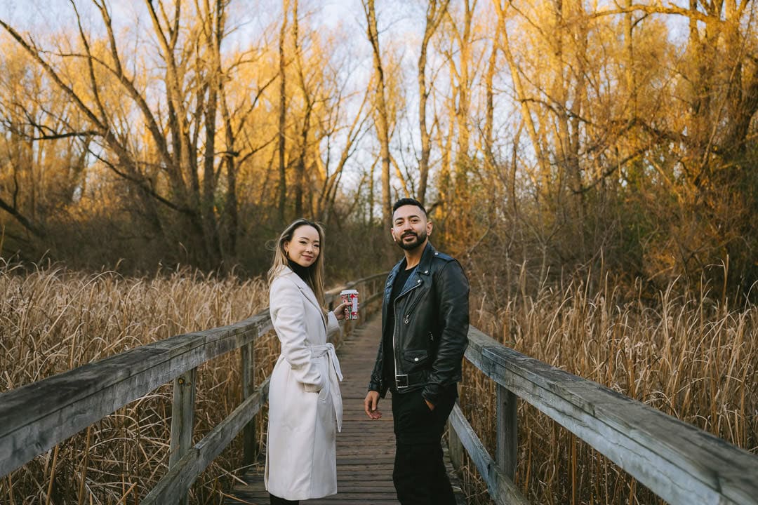 Couple on the boardwalk in fall, Toogood Pond, Unionville
